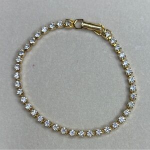 Elegant Gold Tone and Rhinestone Tennis Bracelet (Tarnish Free) 7.25”
